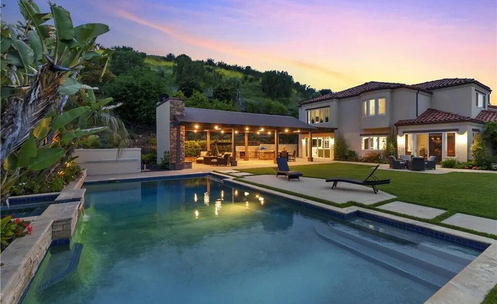 IN ESCROW! Immaculate 3.5 acre Mediterraneanstyle Gated Estate in The